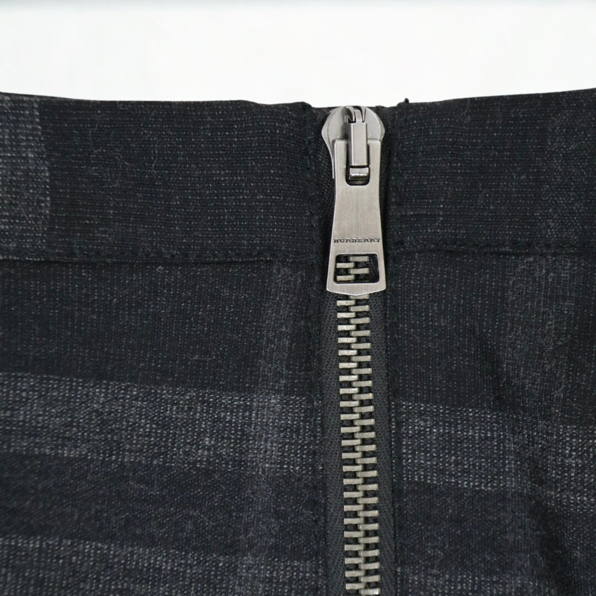 Vintage Burberry Brit black and gray plaid pleated mini skirt with exposed zip, late-2000s