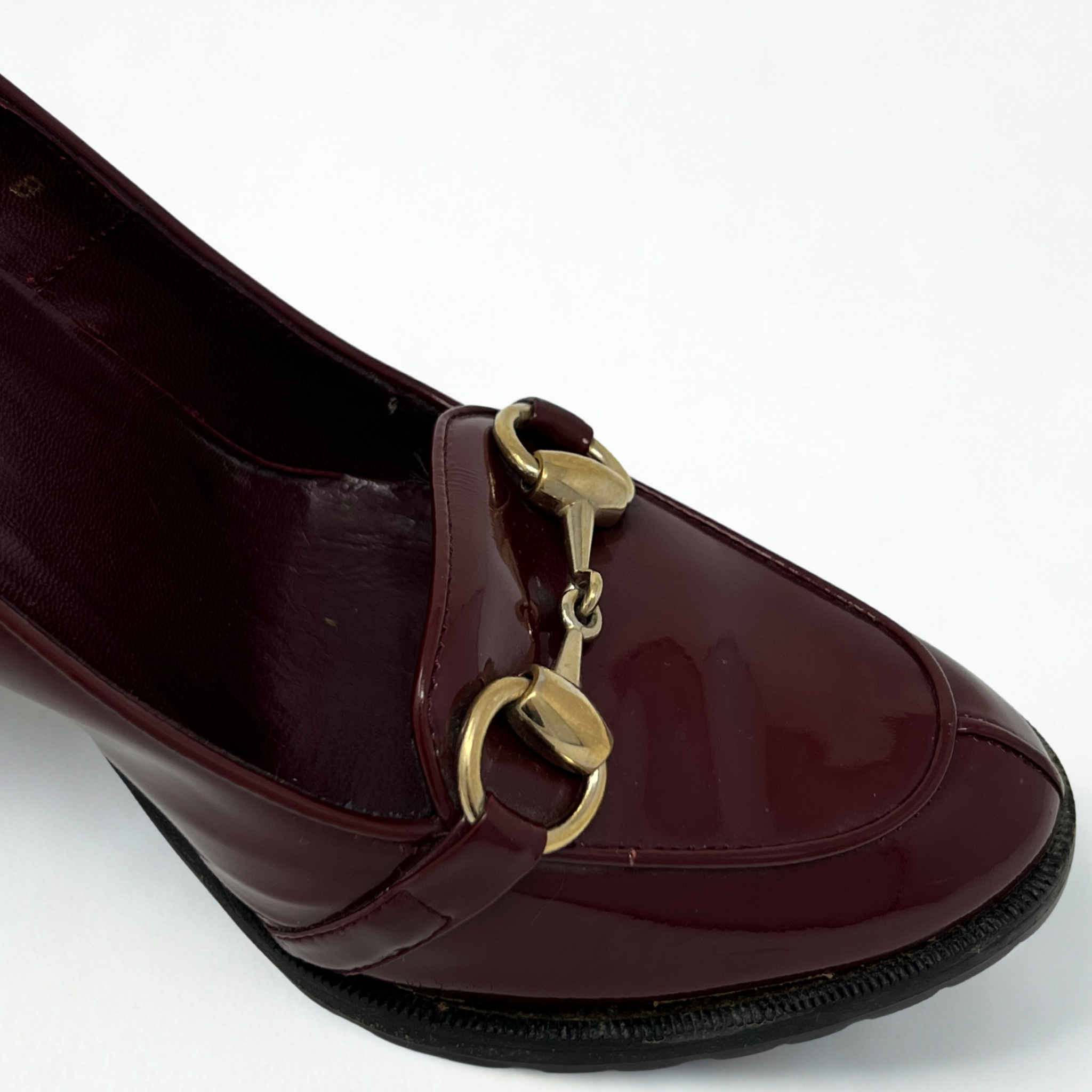 Vintage Gucci burgundy patent leather heeled loafers with gold-tone horsebit, Tom Ford-era design