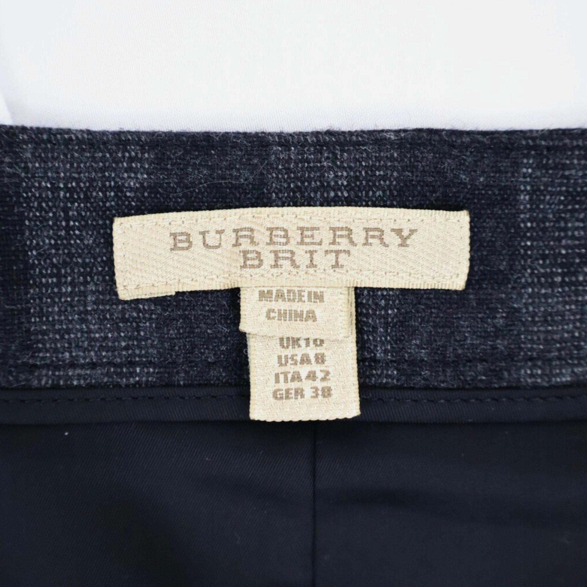 Vintage Burberry Brit black and gray plaid pleated mini skirt with exposed zip, late-2000s