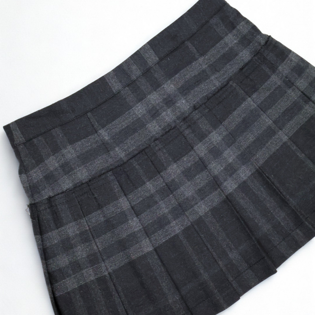 Vintage Burberry Brit black and gray plaid pleated mini skirt with exposed zip, late-2000s